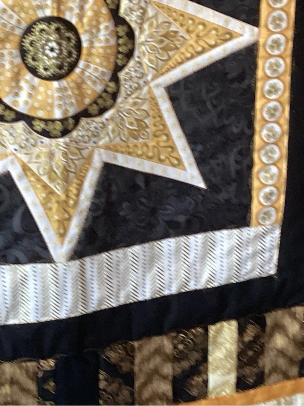 NWT. Gold and Black Star Lap Quilt